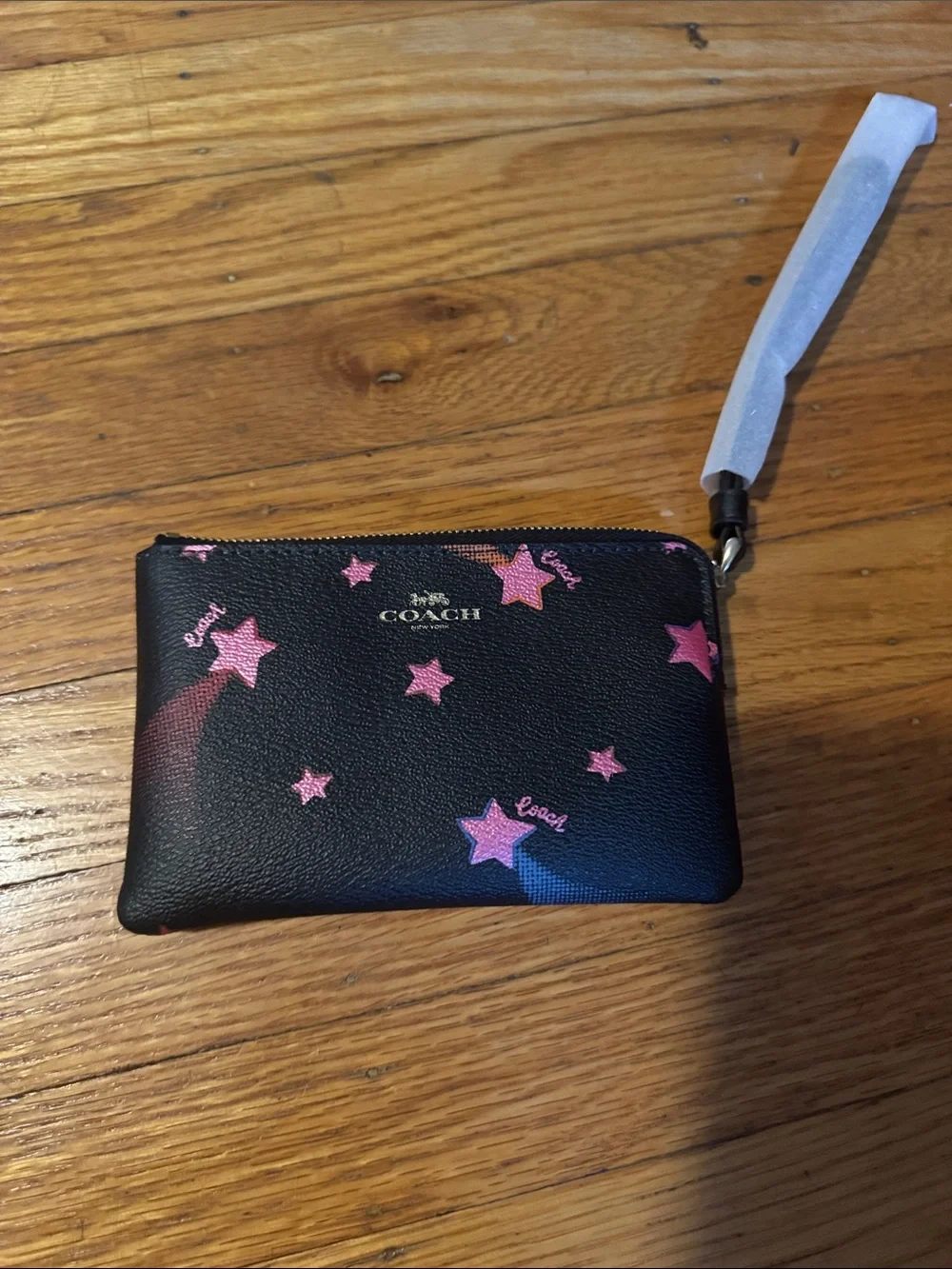 COACH Black Leather wristlet with Pink Star Accents